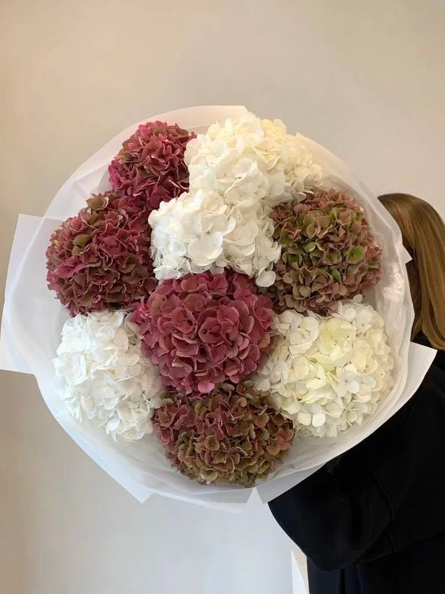Ramos naturales de flores otoñales en tonos cálidos y elegantes – The Prestige Roses Madrid