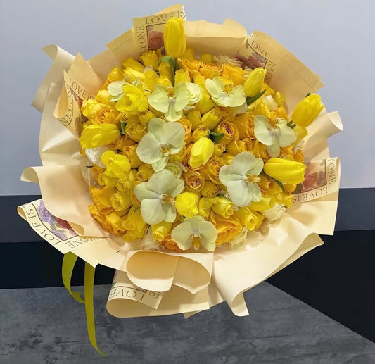 ramo premium de rosas amarillas con tulipanes y orquídeas