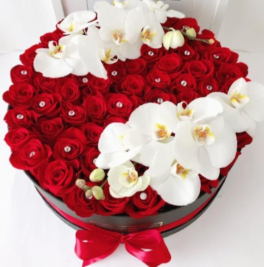 Cajas de Rosas Preservadas con orquideas frescas o artificiales
